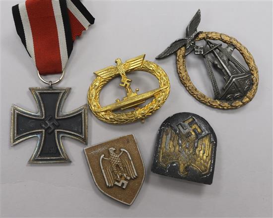 A 2nd class Iron cross, U-Boat badge, two German badges, Luftwaffe sea battle badge